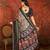 Grey silk cotton printed saree with unstitched blouse piece.