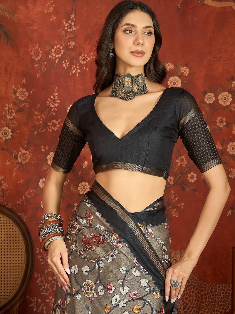 Grey silk cotton printed saree with unstitched blouse piece.