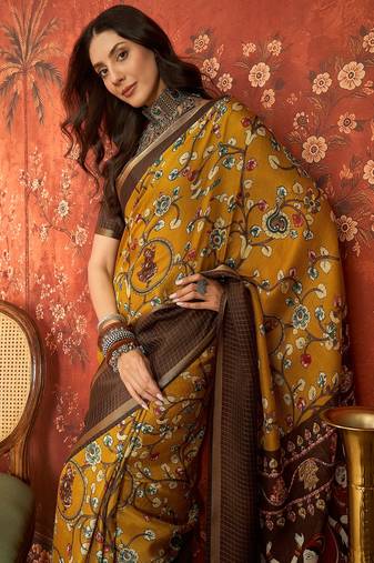 Mustard silk cotton printed saree with unstitched blouse piece.