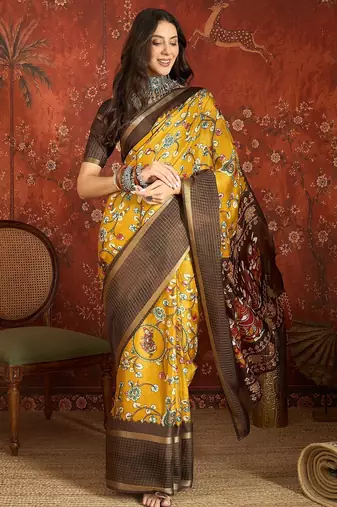 Mustard silk cotton printed saree with unstitched blouse piece.