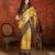 Mustard silk cotton printed saree with unstitched blouse piece.