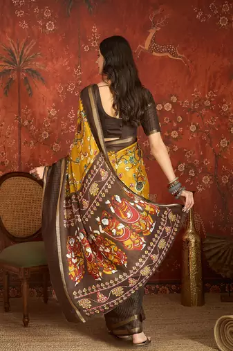 Mustard silk cotton printed saree with unstitched blouse piece.