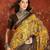Mustard silk cotton printed saree with unstitched blouse piece.