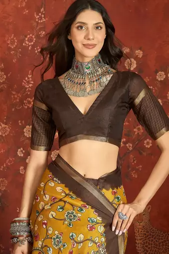 Mustard silk cotton printed saree with unstitched blouse piece.