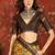 Mustard silk cotton printed saree with unstitched blouse piece.