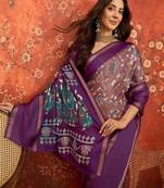 Purple silk cotton printed saree with unstitched blouse piece.
