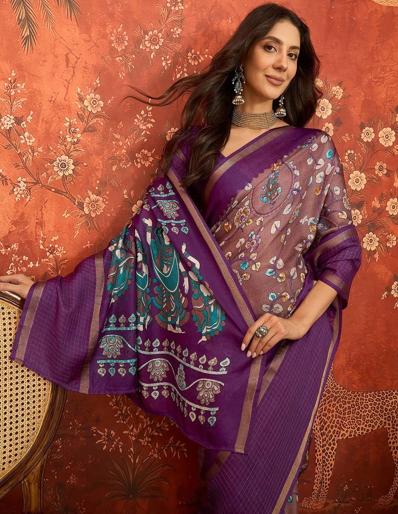 Purple silk cotton printed saree with unstitched blouse piece.