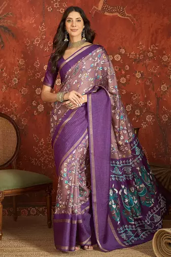 Purple silk cotton printed saree with unstitched blouse piece.