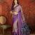 Purple silk cotton printed saree with unstitched blouse piece.