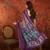 Purple silk cotton printed saree with unstitched blouse piece.