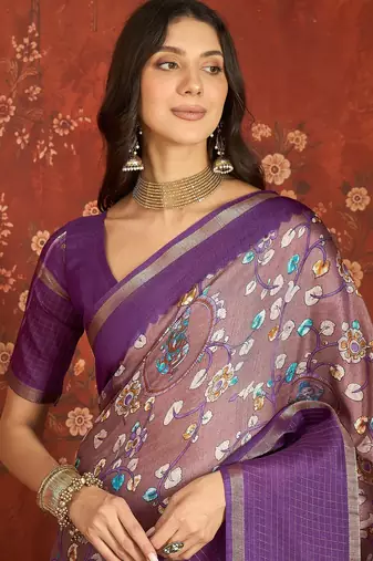Purple silk cotton printed saree with unstitched blouse piece.