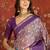 Purple silk cotton printed saree with unstitched blouse piece.