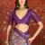 Purple silk cotton printed saree with unstitched blouse piece.