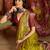 Green silk cotton printed saree with unstitched blouse piece.