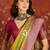 Green silk cotton printed saree with unstitched blouse piece.