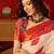 Cream silk cotton bandhni saree with unstitched blouse piece.