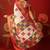 Cream silk cotton bandhni saree with unstitched blouse piece.