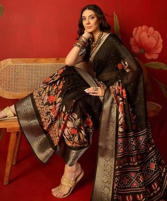 Black chiffon printed saree with unstitched blouse piece. 1