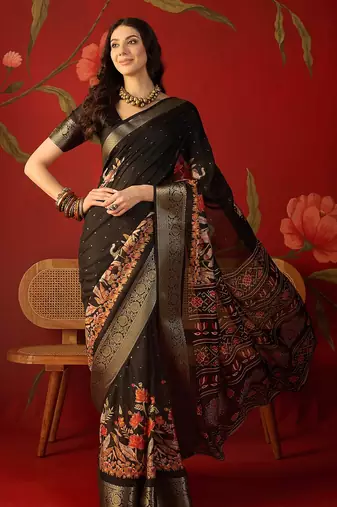 Black chiffon printed saree with unstitched blouse piece.