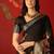 Black chiffon printed saree with unstitched blouse piece.
