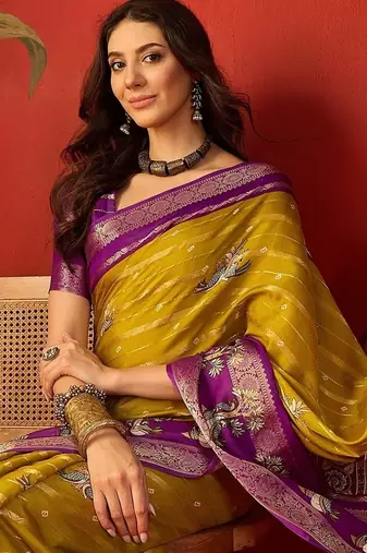 Mehndi silk cotton printed saree with unstitched blouse piece.