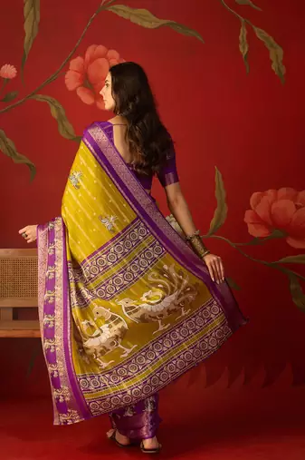 Mehndi silk cotton printed saree with unstitched blouse piece.