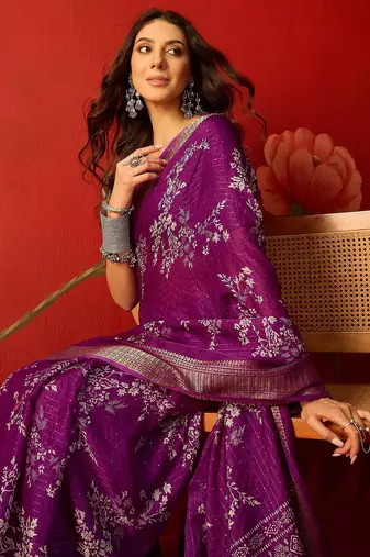 Purple silk cotton printed saree with unstitched blouse piece.