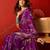 Purple silk cotton printed saree with unstitched blouse piece.