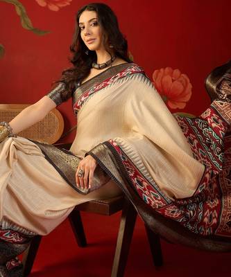 Cream silk cotton printed saree with unstitched blouse piece. 2