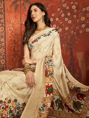 Cream silk cotton printed saree with unstitched blouse piece. 2