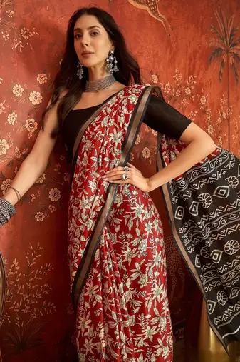 Red silk cotton printed saree with unstitched blouse piece.