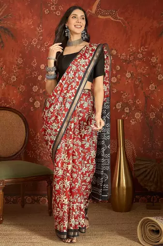 Red silk cotton printed saree with unstitched blouse piece.