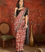 Red silk cotton printed saree with unstitched blouse piece.