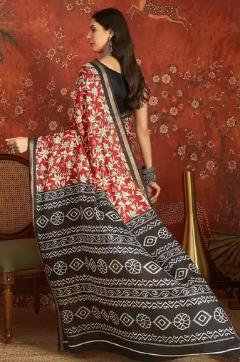 Red silk cotton printed saree with unstitched blouse piece.