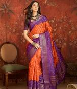 Orange silk cotton printed saree with unstitched blouse piece.