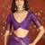 Purple silk cotton printed saree with unstitched blouse piece.