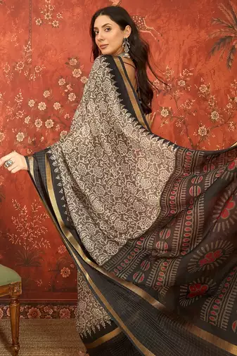 Grey silk cotton printed saree with unstitched blouse piece.