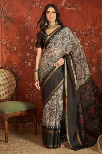 Grey silk cotton printed saree with unstitched blouse piece.