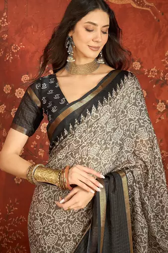 Grey silk cotton printed saree with unstitched blouse piece.
