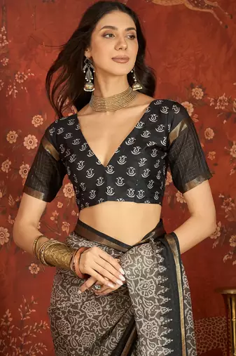 Grey silk cotton printed saree with unstitched blouse piece.