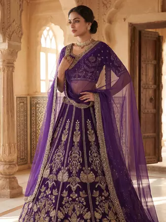 Royal Purple Heavy Embroidered Lehenga Choli with Gold Work & Faux Georgette Dupatta