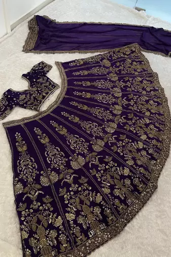 Royal Purple Heavy Embroidered Lehenga Choli with Gold Work & Faux Georgette Dupatta