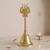 Brass gold bell with mahakal trishul stem