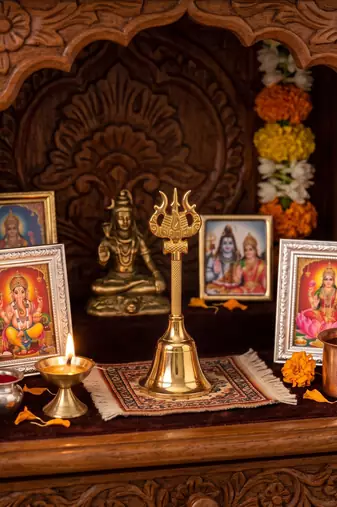 Brass gold bell with mahakal trishul stem