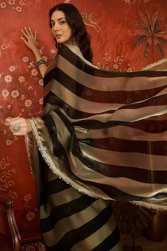 Black & gold tissue satin sequins saree with unstitched blouse piece.
