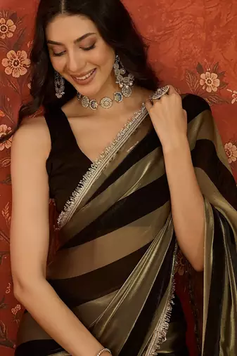Black & gold tissue satin sequins saree with unstitched blouse piece.