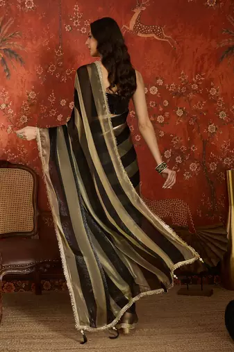 Black & gold tissue satin sequins saree with unstitched blouse piece.