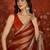 Orange & gold tissue satin sequins saree with unstitched blouse piece.