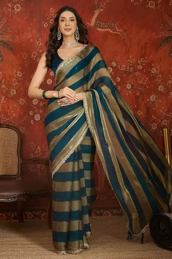 Teal & gold tissue satin sequins saree with unstitched blouse piece.