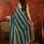 Teal & gold tissue satin sequins saree with unstitched blouse piece.